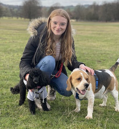 Adele in the park with Two of her dogs