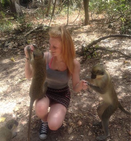 Adele in the wood with 2 monkeys