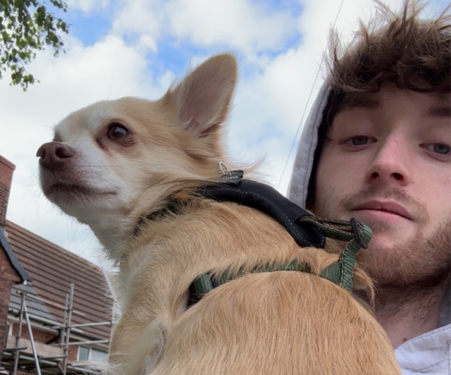 image of curtis and his dog on a walk