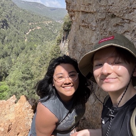 image of daffni and her partner on a mountain hike