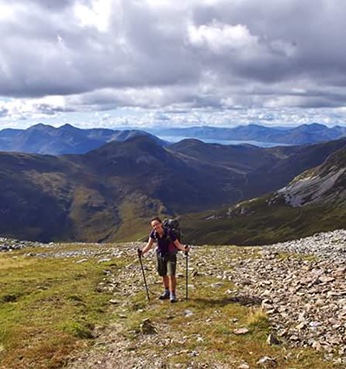 image of engla hiking on a mountain