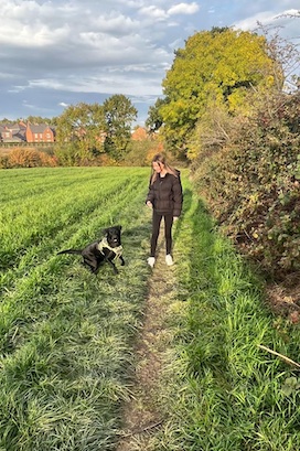 image of holly walking her dog