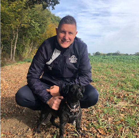 image of lee and his dog on a walk