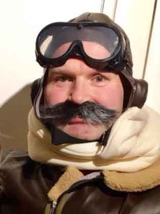 image of nick dressed as a pilot