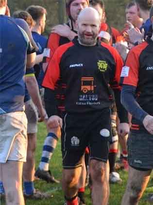 image of nick playing rugby