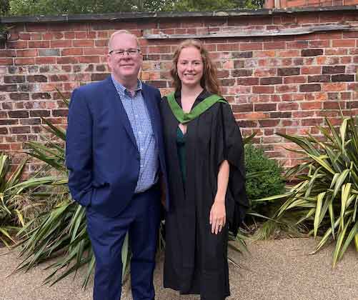 image of richard and his daughter at her graduation